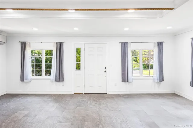 a view of an empty room with window