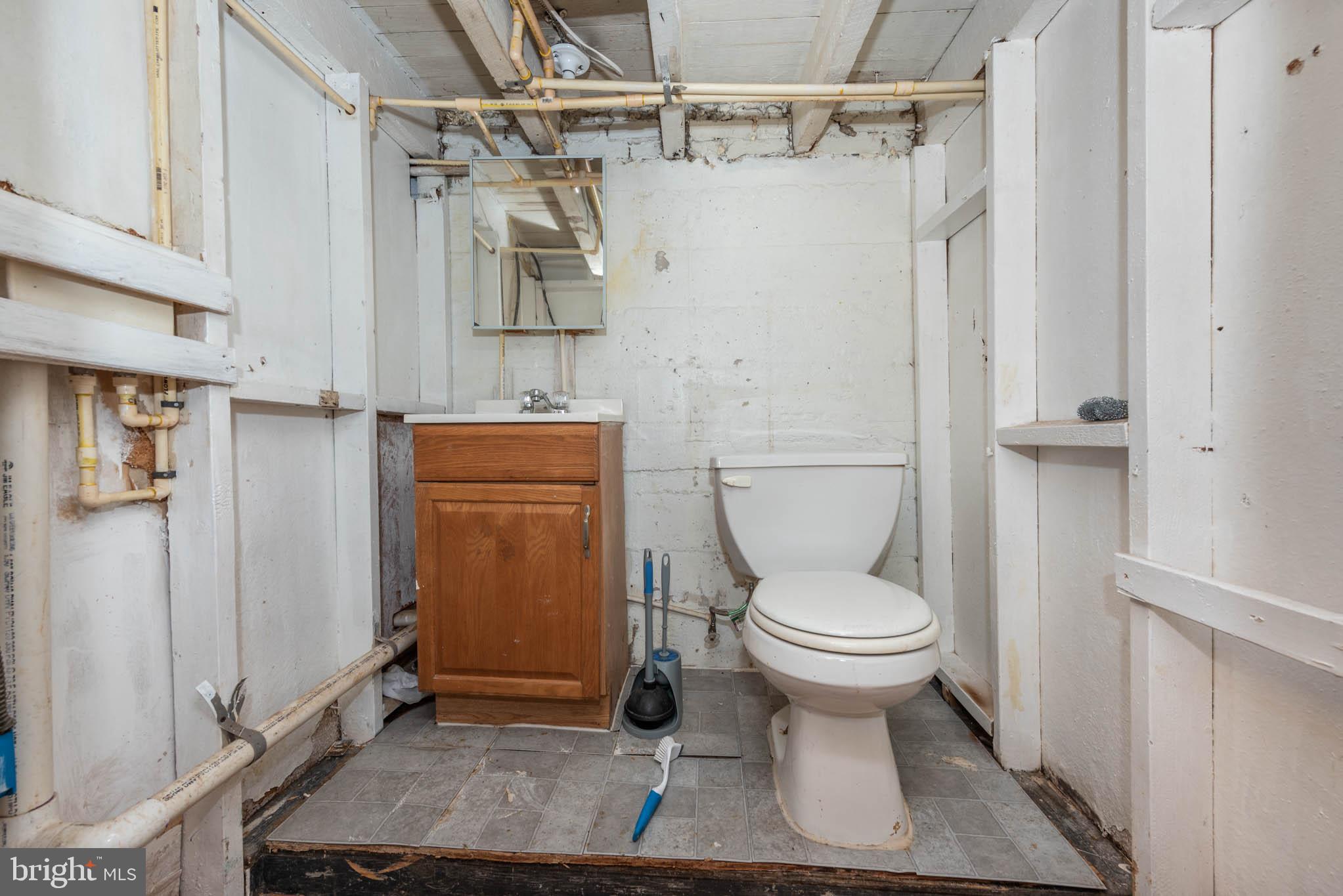 2117 Belair Road Baltimore, MD 21213 - Photo 21 of 27 basement half bathroom