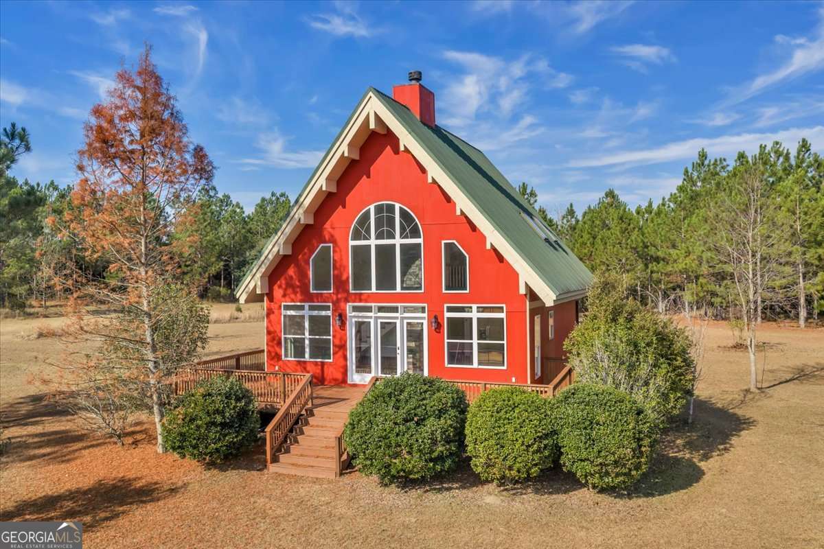 11157 Cannonville Road Rochelle, GA 31079 - Photo 30 of 38 a view of a house with a yard