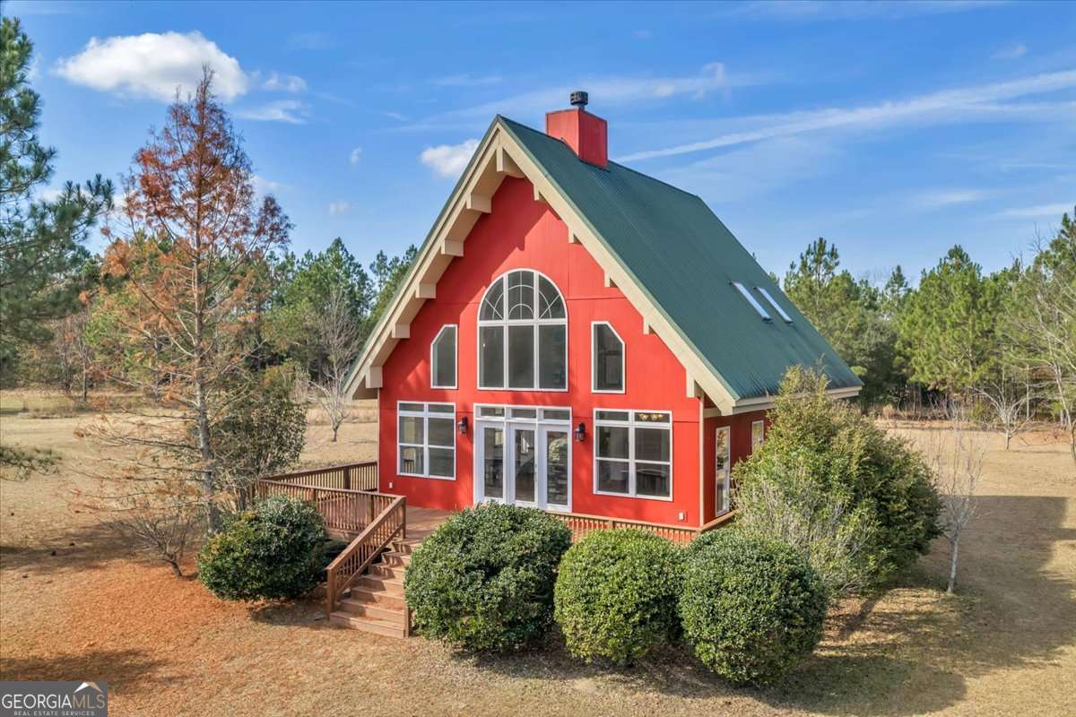 11157 Cannonville Road Rochelle, GA 31079 - Photo 32 of 38 a view of a house with a yard