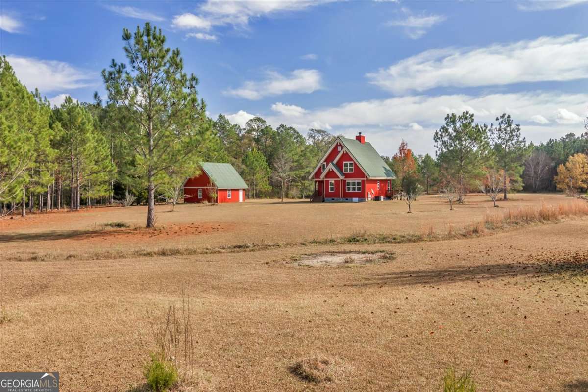11157 Cannonville Road Rochelle, GA 31079 - Photo 33 of 38 a view of beach and sign board