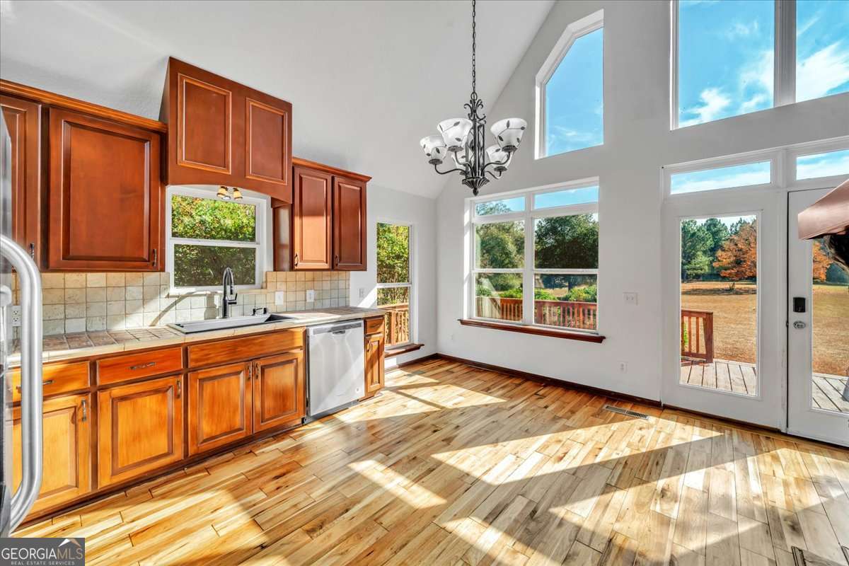 11157 Cannonville Road Rochelle, GA 31079 - Photo 5 of 38 a view of a kitchen with a sink and windows