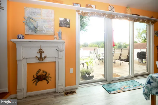 a view of a hallway with a outdoor space