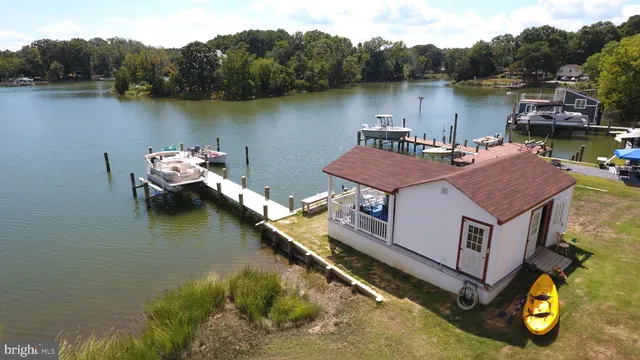 a aerial view of a house with lake view