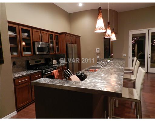 17 Kennesaw Road Henderson, NV 89052 - Photo 12 of 23 Kitchen. view of kitchen & breakfast bar