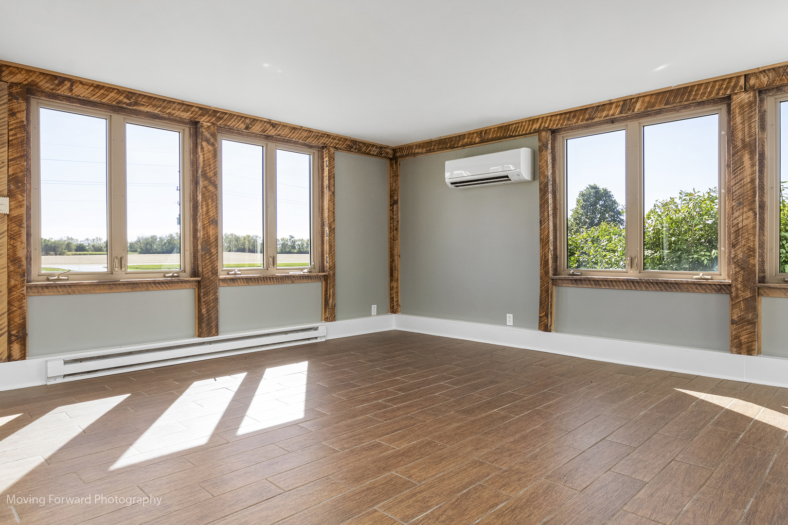 16910 Streit Road Harvard, IL 60033 - Photo 23 of 40 a view of an empty room with wooden floor and a window