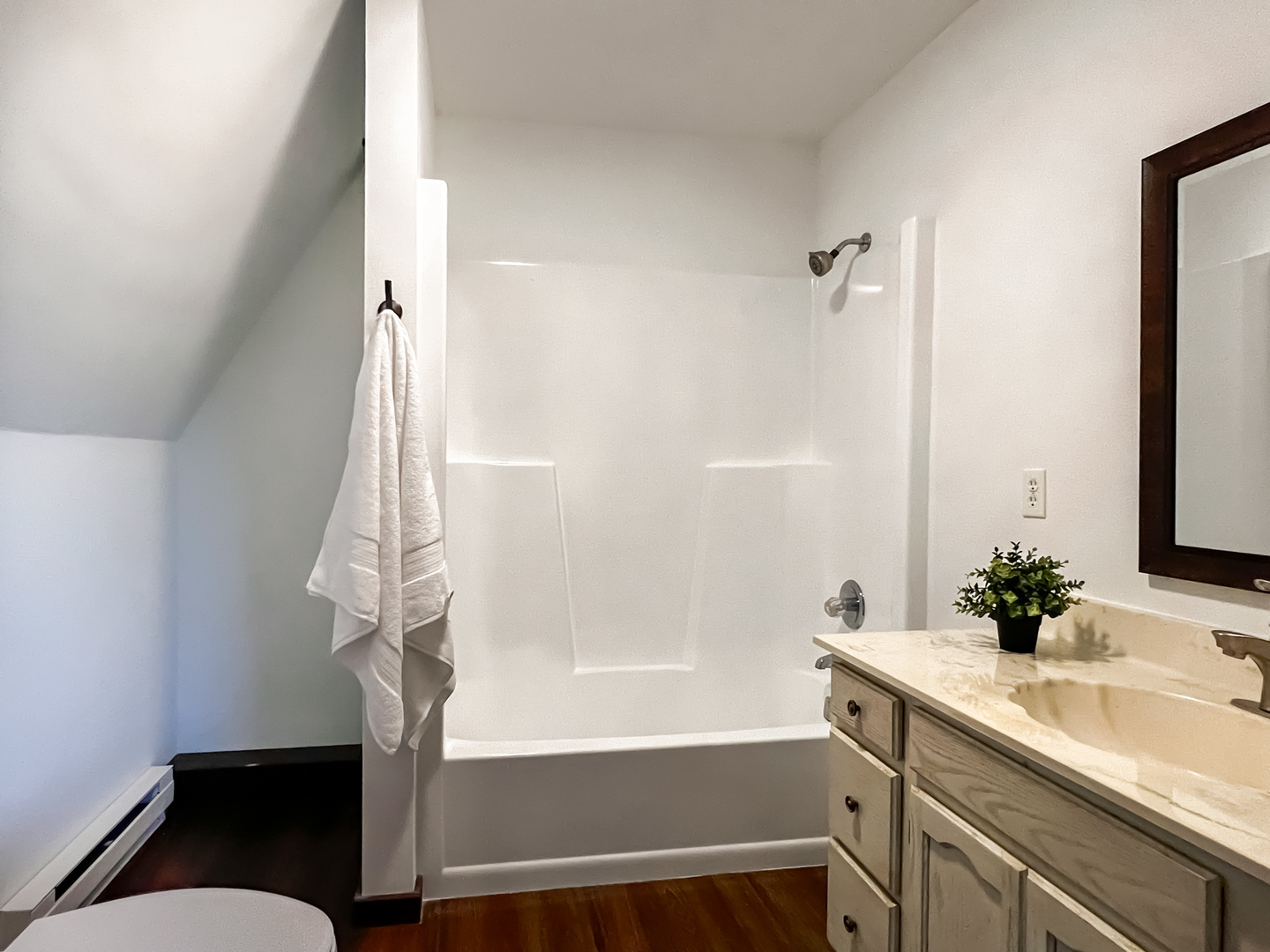 16910 Streit Road Harvard, IL 60033 - Photo 28 of 40 a bathroom with a tub sink and a mirror