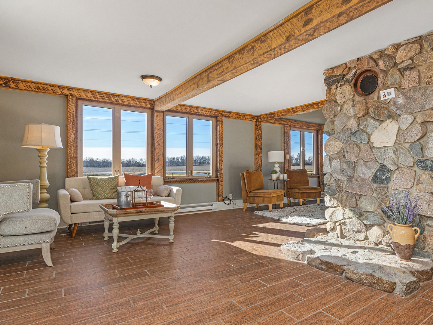 16910 Streit Road Harvard, IL 60033 - Photo 7 of 40 a living room with furniture and a floor to ceiling window