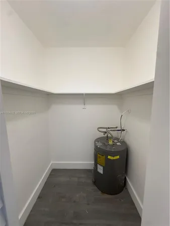 a room with storage and utility