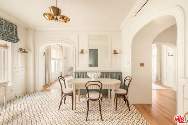 a view of a dining room with furniture
