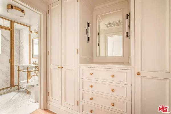 a bathroom with a bathtub and a sink