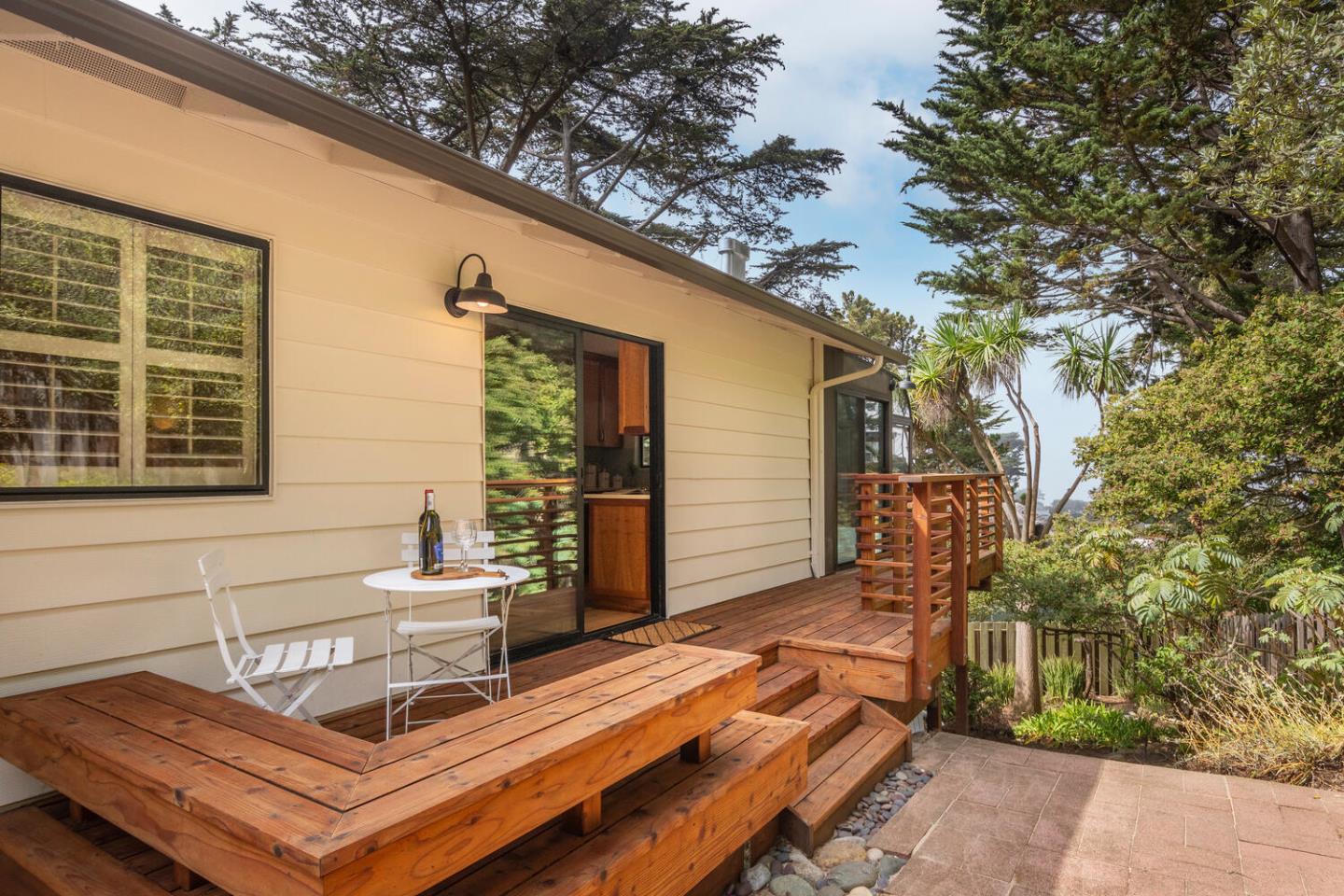 701 Canyon Drive Pacifica, CA 94044 - Photo 15 of 42 a view of a house with backyard and sitting area