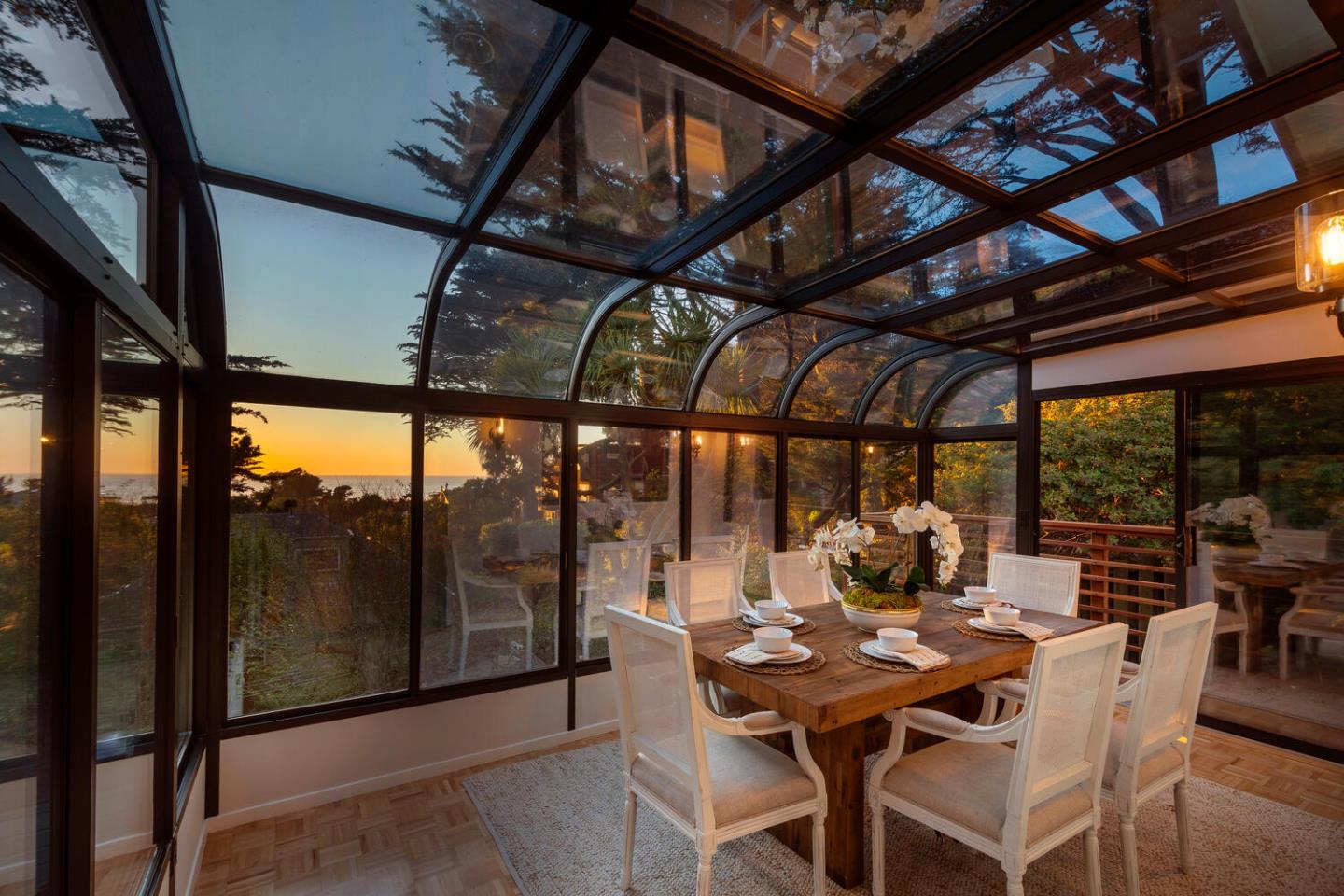 701 Canyon Drive Pacifica, CA 94044 - Photo 2 of 42 a dining room with furniture and wooden floor