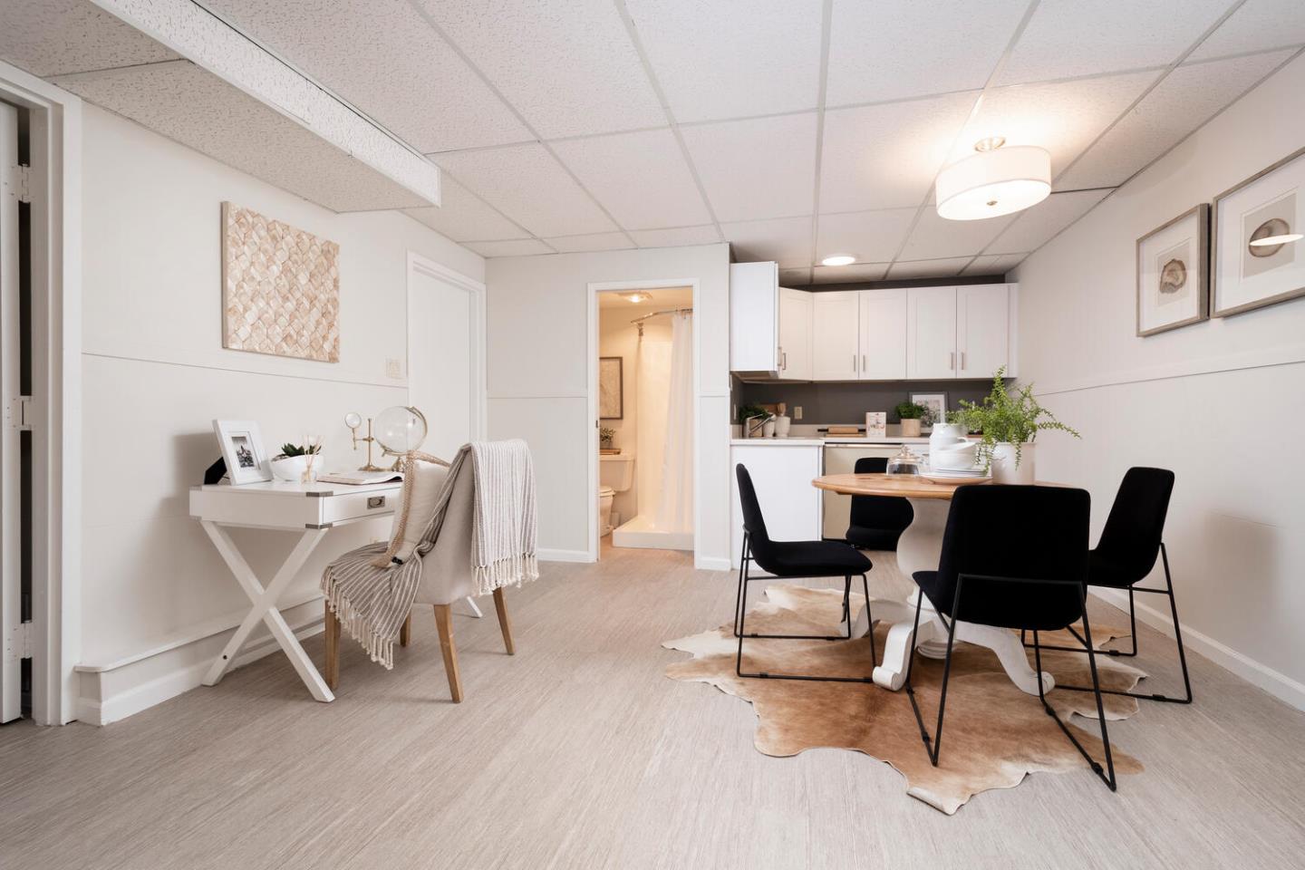 701 Canyon Drive Pacifica, CA 94044 - Photo 24 of 42 a view of a dining room with furniture and wooden floor