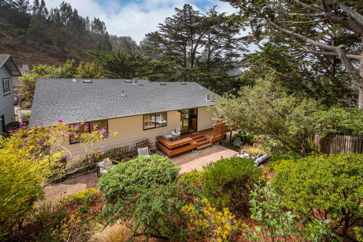 701 Canyon Drive Pacifica, CA 94044 - Photo 27 of 42 an aerial view of a house with swimming pool and garden