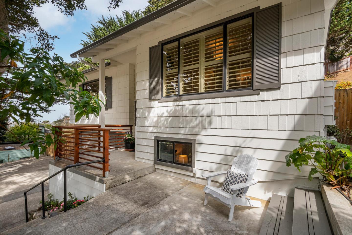701 Canyon Drive Pacifica, CA 94044 - Photo 40 of 42 a front view of a house with a yard