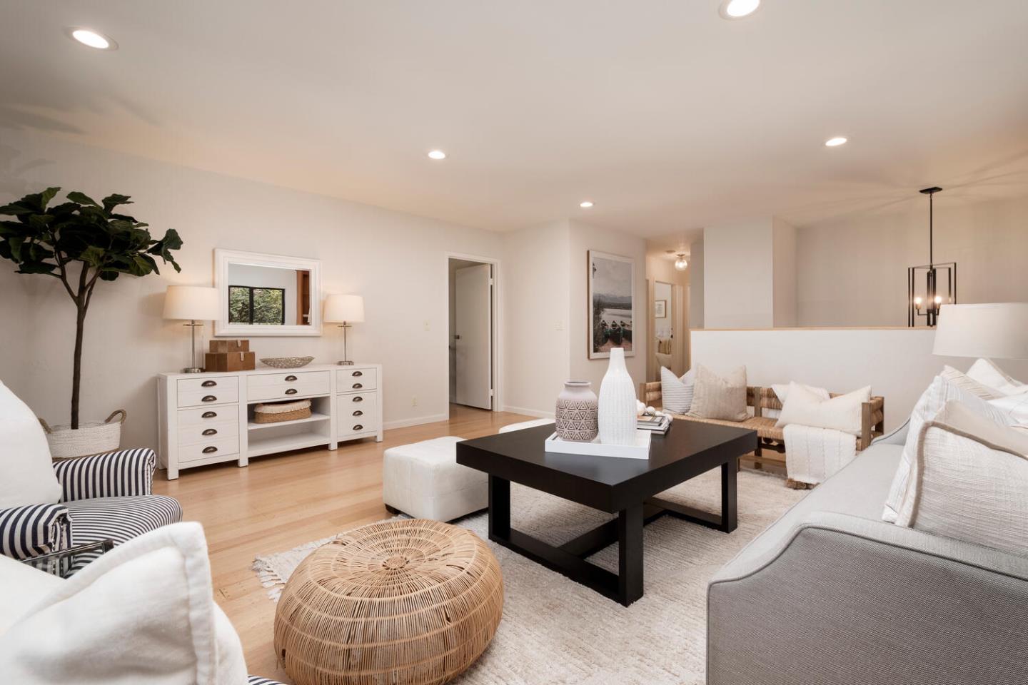 701 Canyon Drive Pacifica, CA 94044 - Photo 7 of 42 a living room with furniture and a potted plant