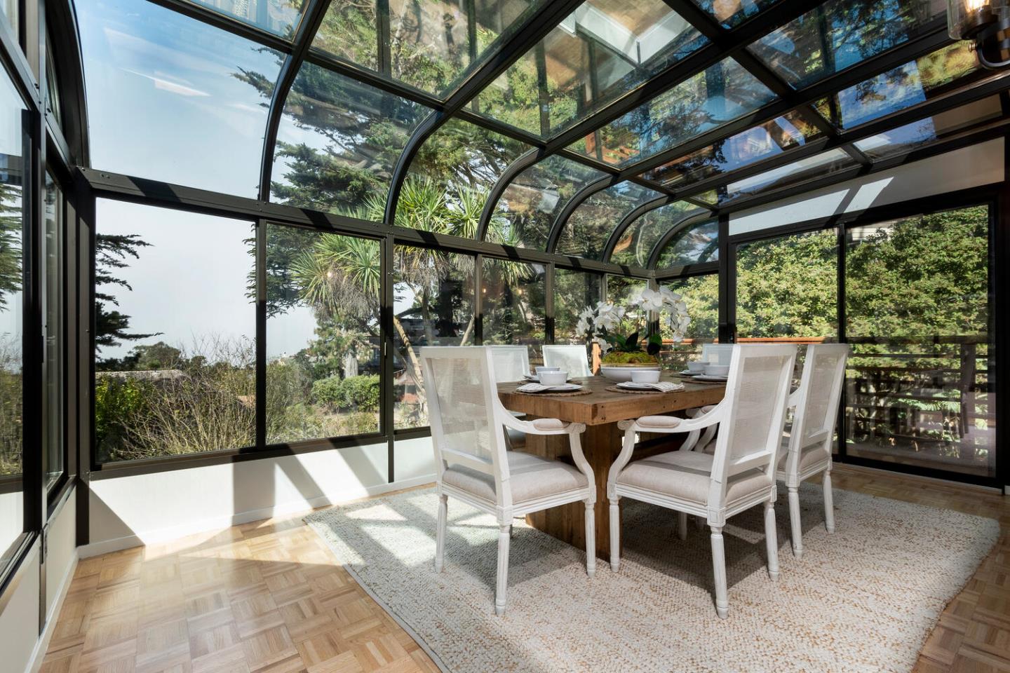 701 Canyon Drive Pacifica, CA 94044 - Photo 8 of 42 a dining room with furniture and large window
