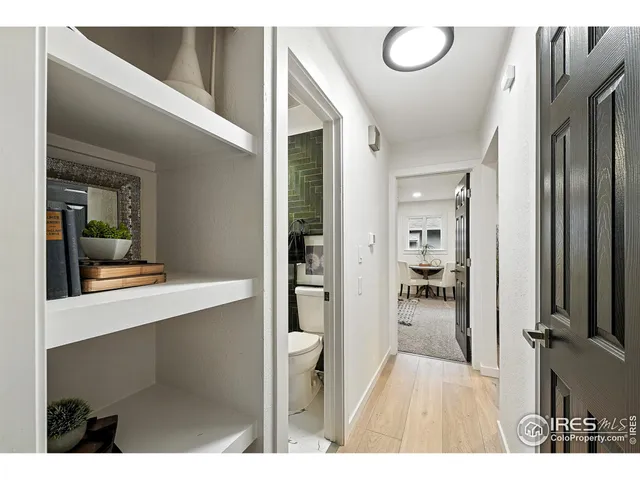 a bathroom with a sink a mirror and a shower