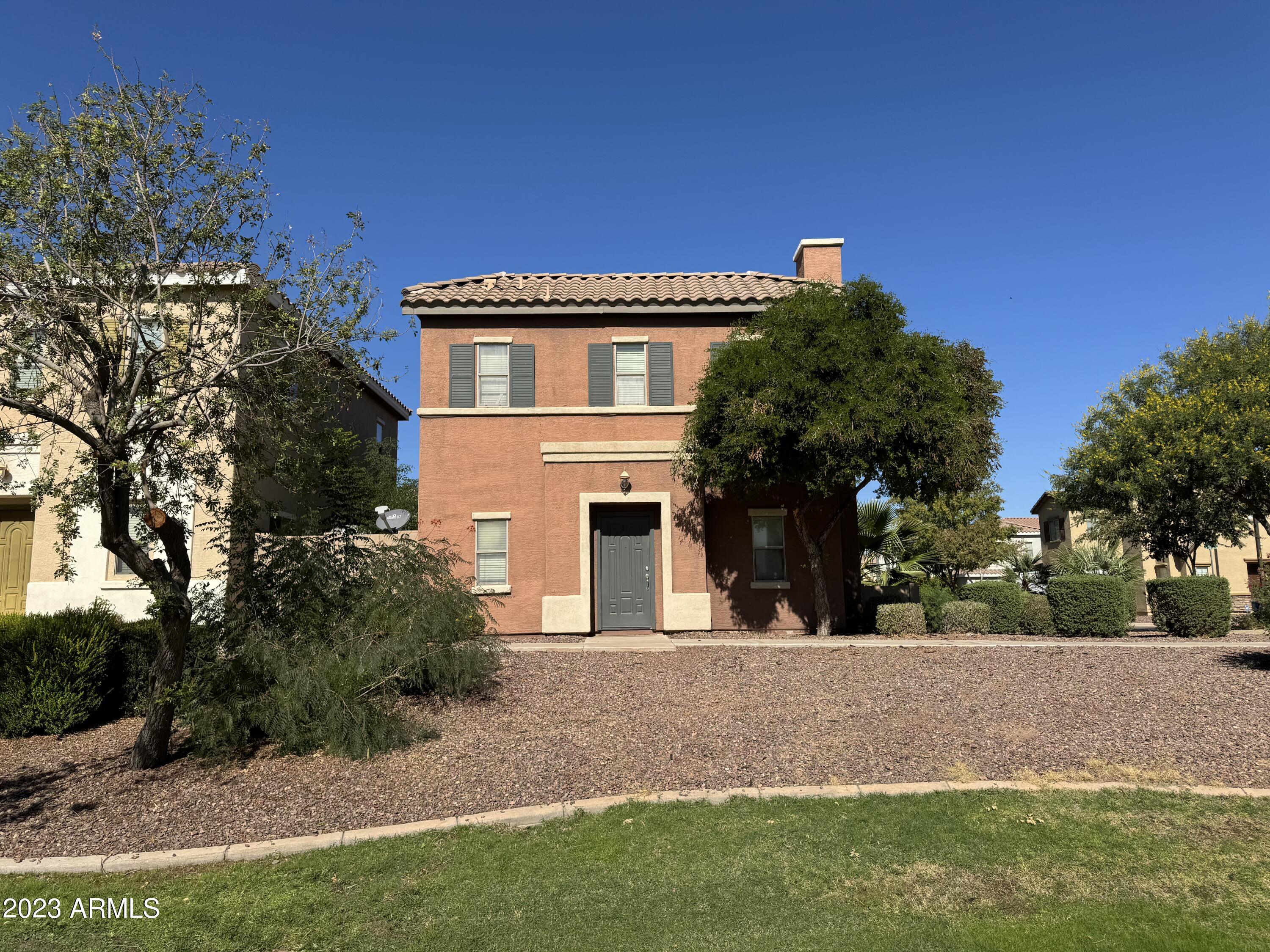 426 North Citrus Lane Gilbert, AZ 85234 - Photo 1 of 3 a front view of house with yard
