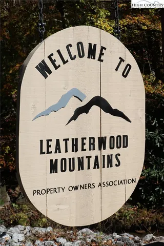 a view of a park that has a sign on it