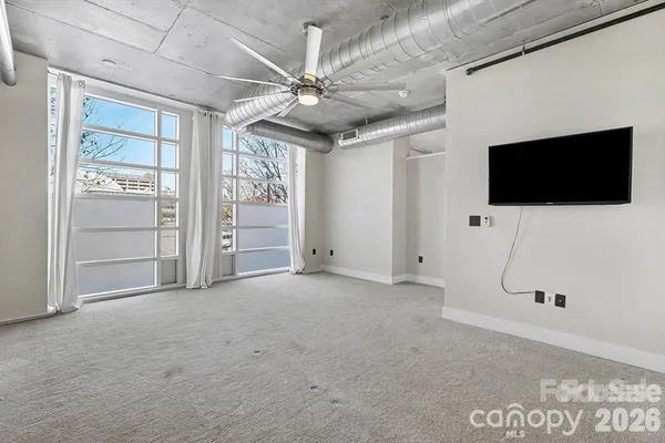 a view of a livingroom with a flat screen tv