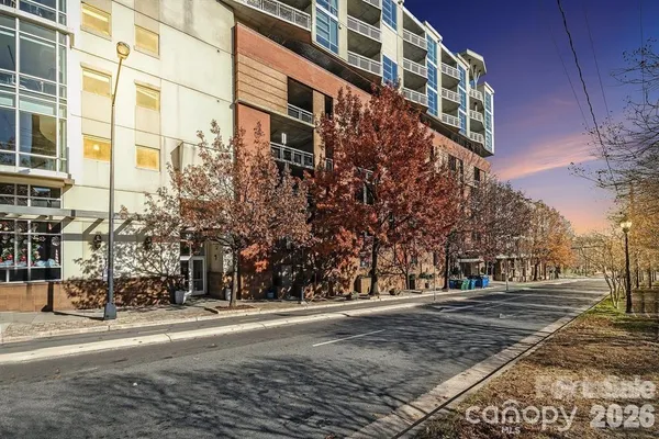 a view of a building with a street