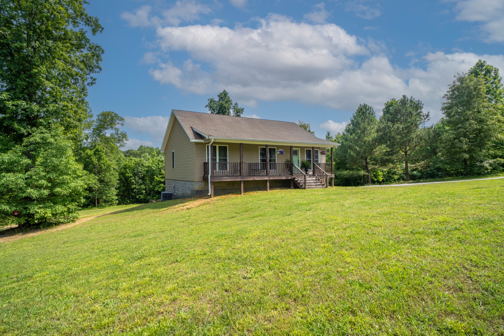a front view of a house with yard
