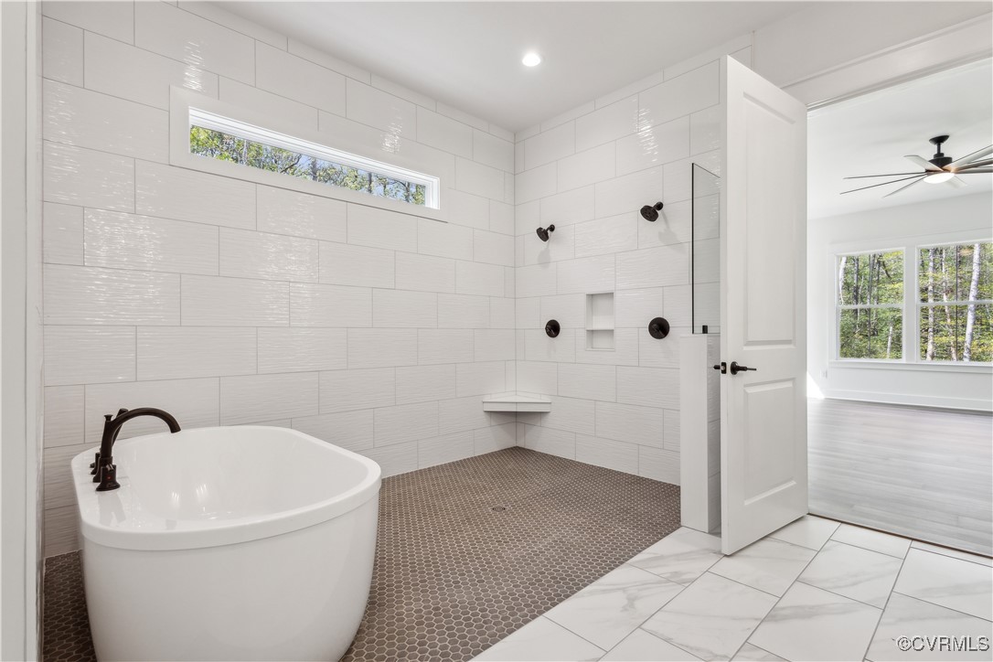 4750 Studley Road Mechanicsville, VA 23116 - Photo 16 of 36 a spacious bathroom with a bathtub and toilet