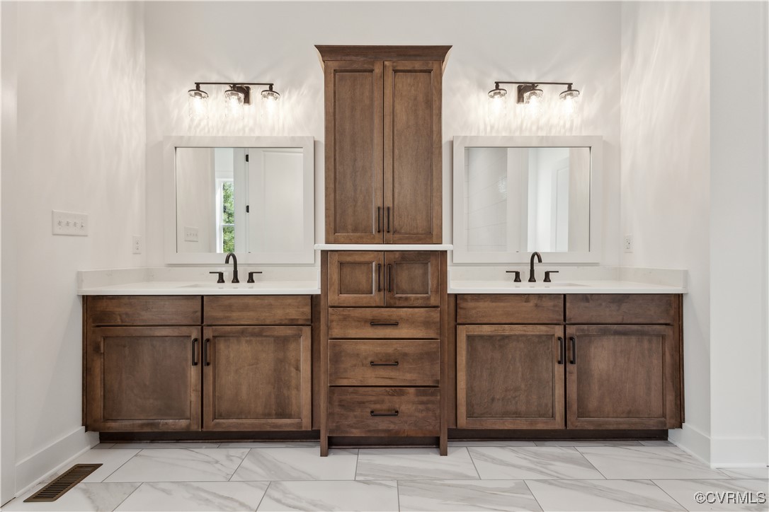 4750 Studley Road Mechanicsville, VA 23116 - Photo 17 of 36 a bathroom with a sink vanity and mirror