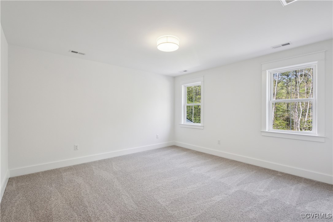 4750 Studley Road Mechanicsville, VA 23116 - Photo 27 of 36 an empty room with windows