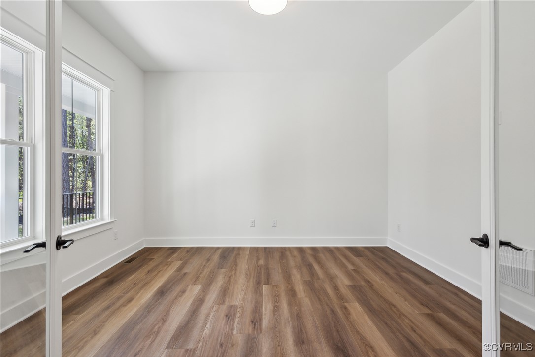 4750 Studley Road Mechanicsville, VA 23116 - Photo 10 of 36 a view of a room with wooden floor and small window