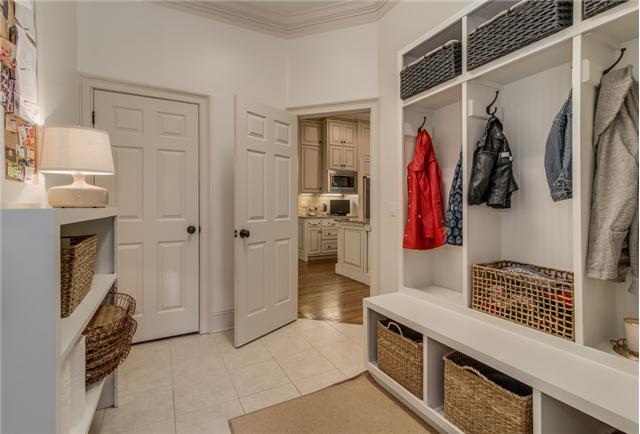 129 Alton Road Nashville, TN 37205 - Photo 14 of 20 a view of walk in closet with clothes and shoes