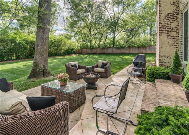 129 Alton Road Nashville, TN 37205 - Photo 18 of 20 a view of a patio with couches chairs and a yard