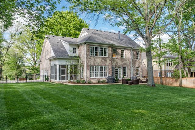 129 Alton Road Nashville, TN 37205 - Photo 20 of 20 a front view of a house with a garden