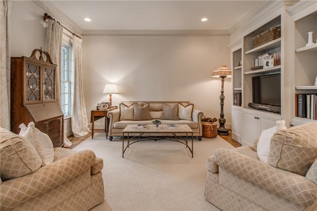 129 Alton Road Nashville, TN 37205 - Photo 2 of 20 a living room with furniture and a flat screen tv