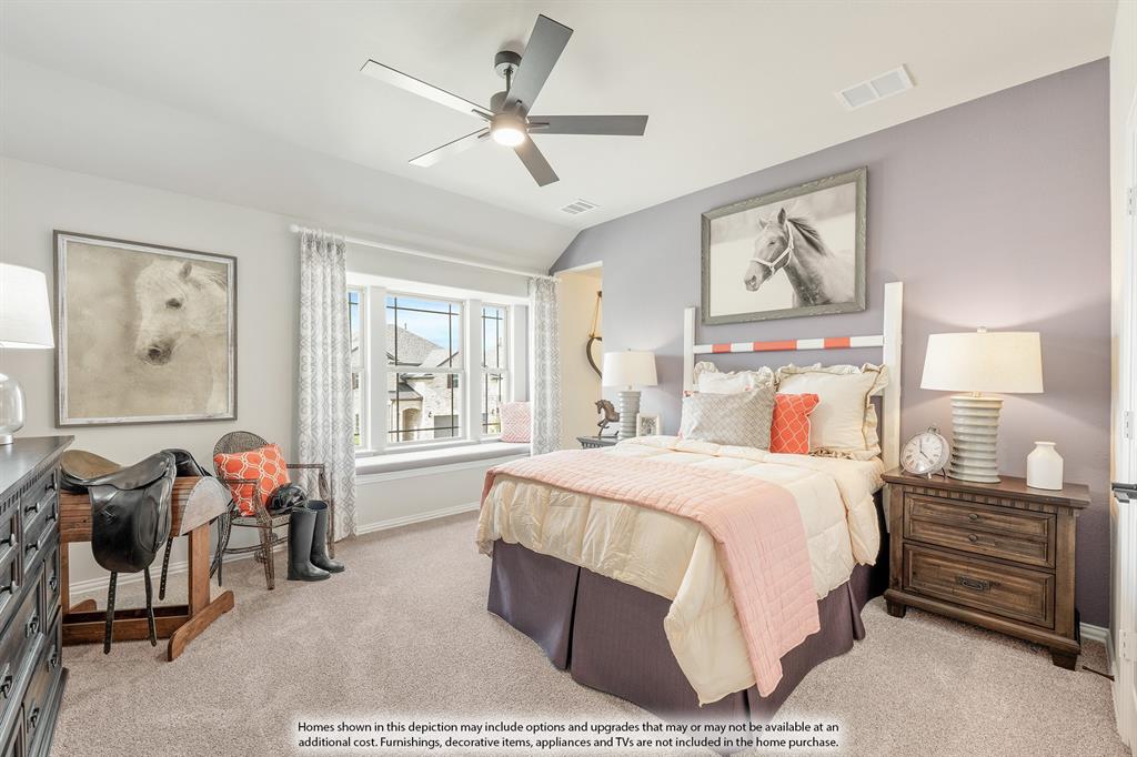 5930 Merian Drive Pilot Point, TX 76258 - Photo 36 of 39 a bedroom with a bed and wooden floor