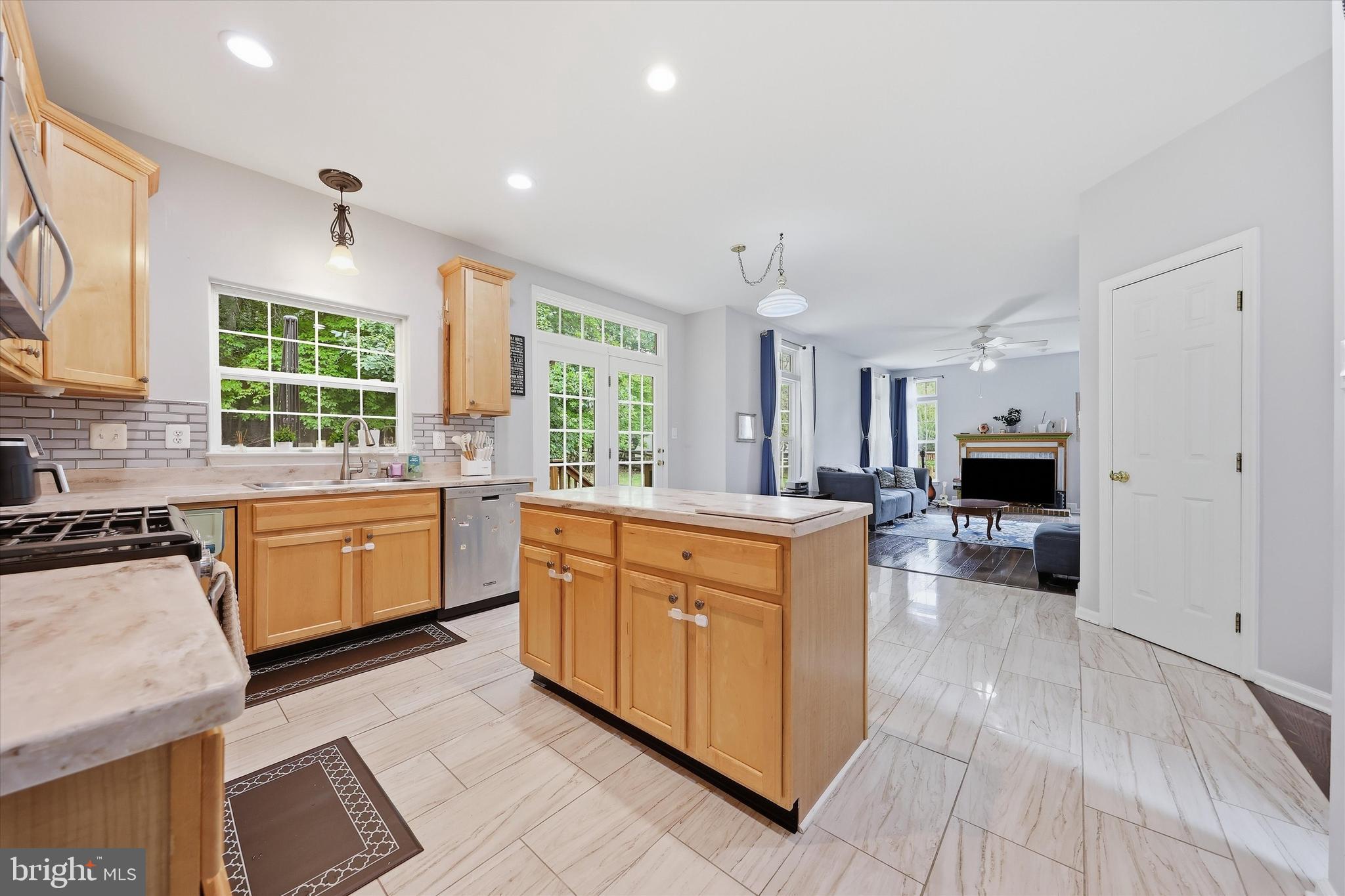6440 Spring Forest Road Frederick, MD 21701 - Photo 12 of 48 Kitchen with Center Island + Breakfast Area