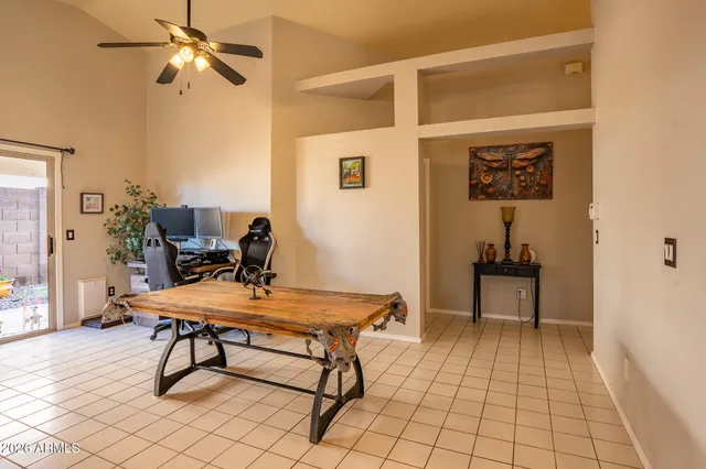 a workspace with furniture and window