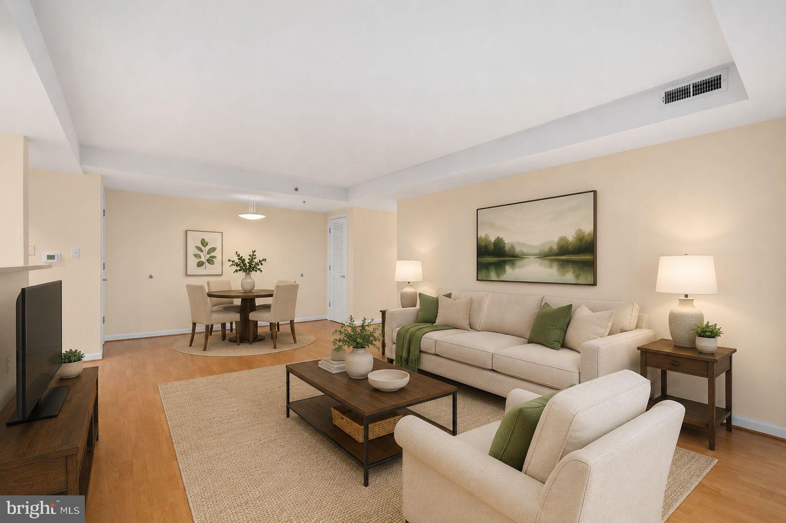 7981 Eastern Avenue Northwest, Unit 219 Silver Spring, MD 20910 - Photo 9 of 45 Virtually staged living/dining area