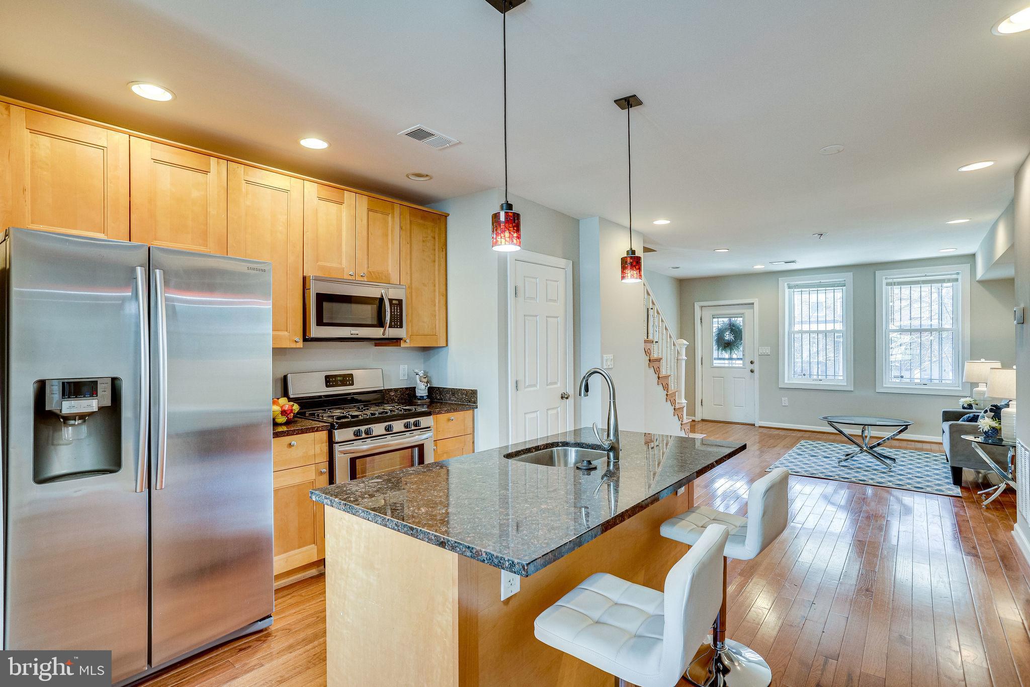 1928 Bennett Place Northeast Washington, DC 20002 - Photo 11 of 40 Open kitchen w/ stainless and granite
