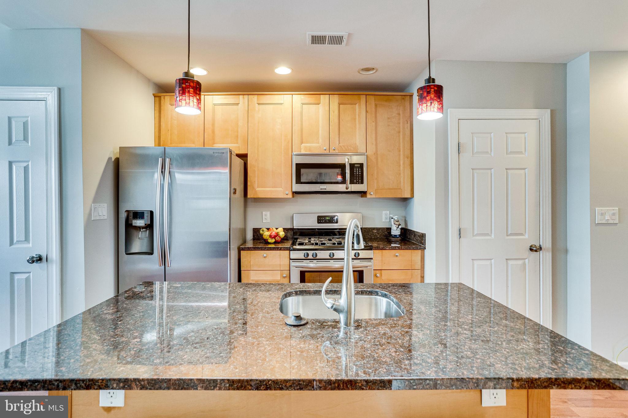 1928 Bennett Place Northeast Washington, DC 20002 - Photo 10 of 40 Open kitchen w/ stainless and granite