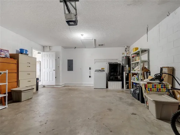 a view of a workspace with furniture
