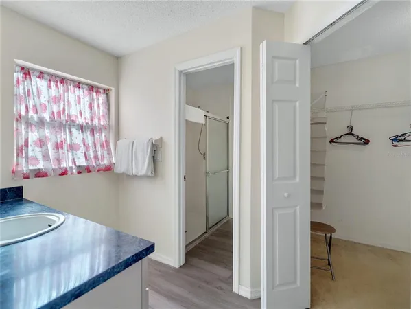 a view of kitchen island with furniture and wooden floor