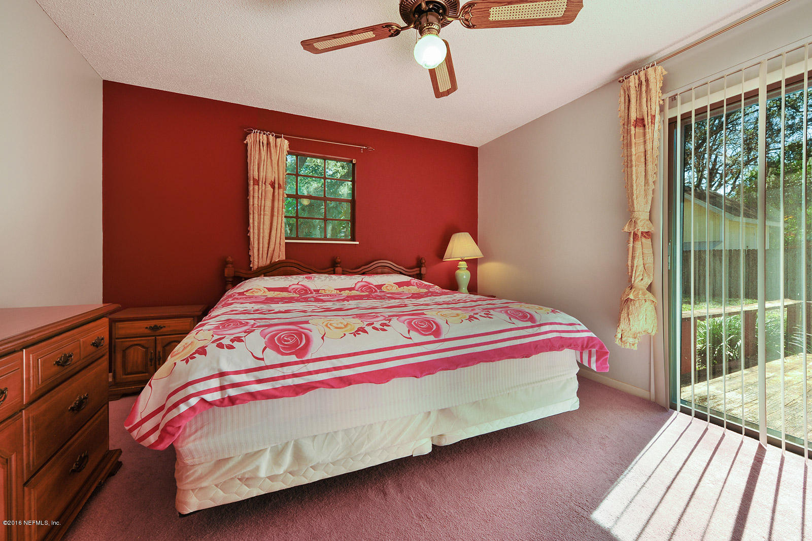 161 Drake Road St. Augustine, FL 32086 - Photo 13 of 15 a bedroom with a bed and a window