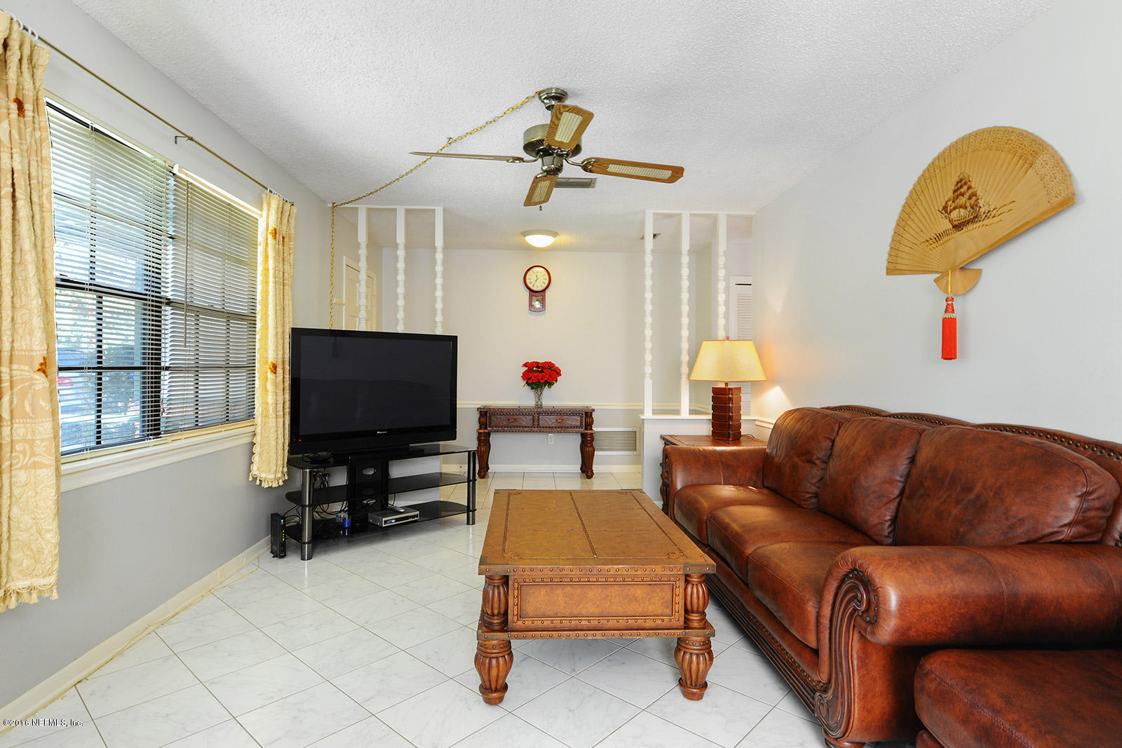 161 Drake Road St. Augustine, FL 32086 - Photo 5 of 15 a living room with furniture and a flat screen tv