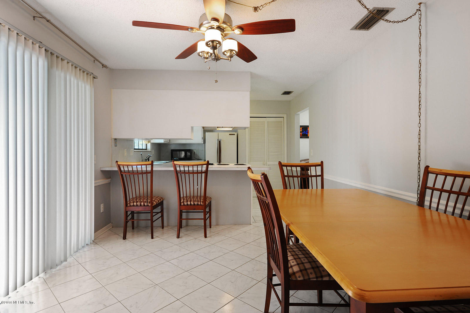 161 Drake Road St. Augustine, FL 32086 - Photo 9 of 15 a dining room with furniture and window