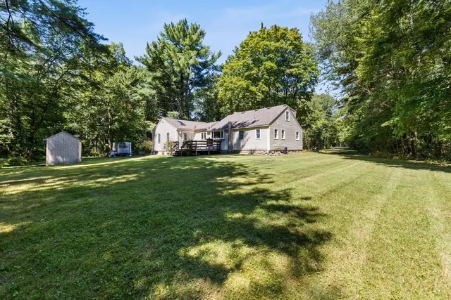 a house with a yard in front of it