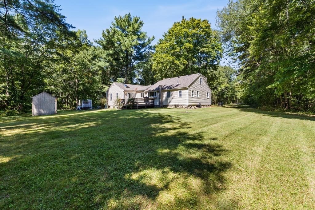 627 First Parish Road Scituate, MA 02066 - Photo 2 of 33 a house with a yard in front of it