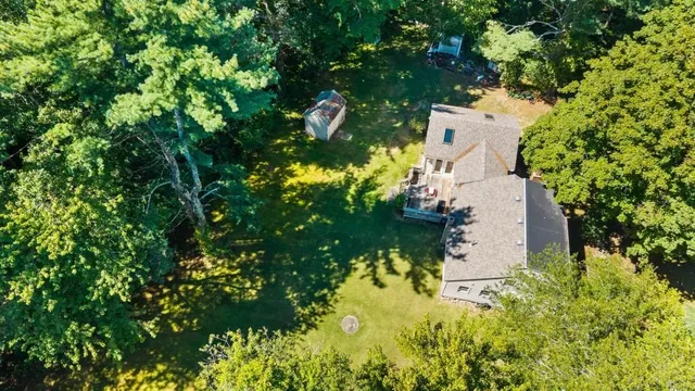 a backyard of a house with lots of green space